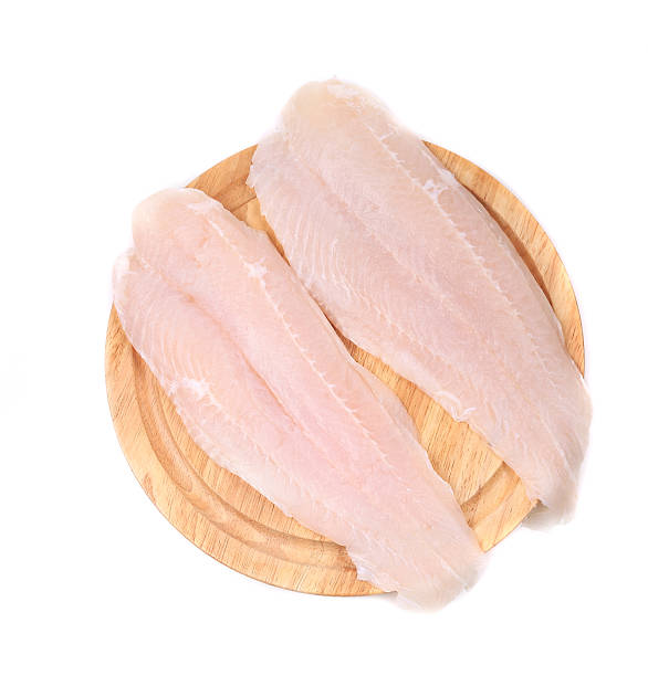 新鮮な pangasius のフィレます。 - cooking kitchen utensil wood isolated ストックフォトと画像