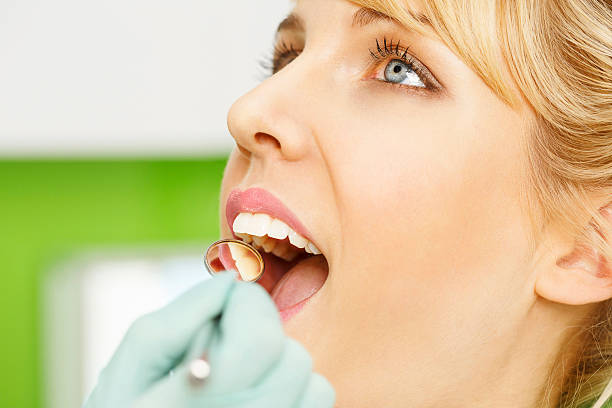 istock Dentistry  Dentist working   Dental  teeth examined by specialist 466337796
