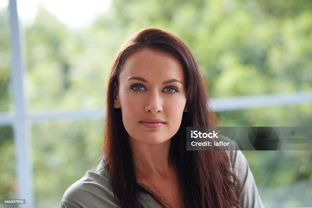 In touch with nature in her living room A young woman relaxing in her living roomhttp://195.154.178.81/DATA/istock_collage/a4/shoots/785198.jpg 2015 Stock Photo