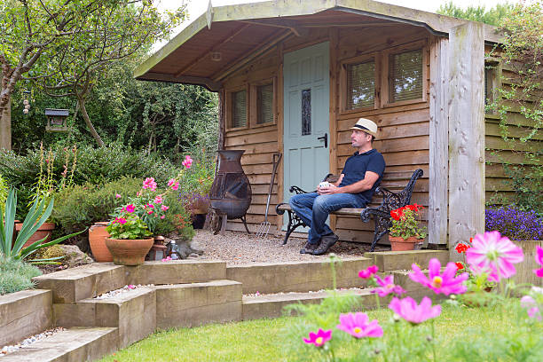 istock Mature Male Relaxing in His Garden 466338968