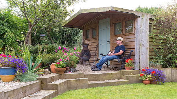 Mature Male Relaxing in His Garden