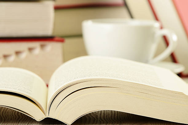 istock Books cup of coffee on the table 466339719
