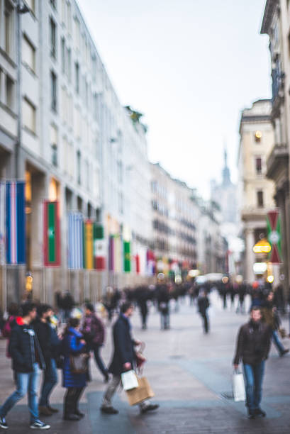 istock blurred city and people 466339747