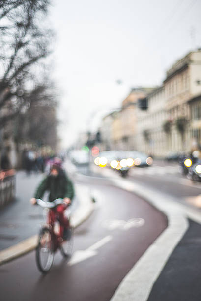 istock blurred city and people 466339853