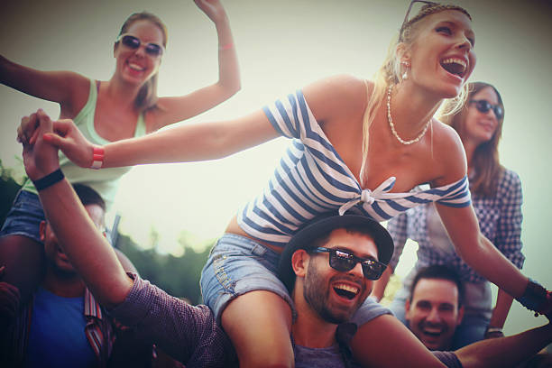 istock People enjoying a concert. 466341784