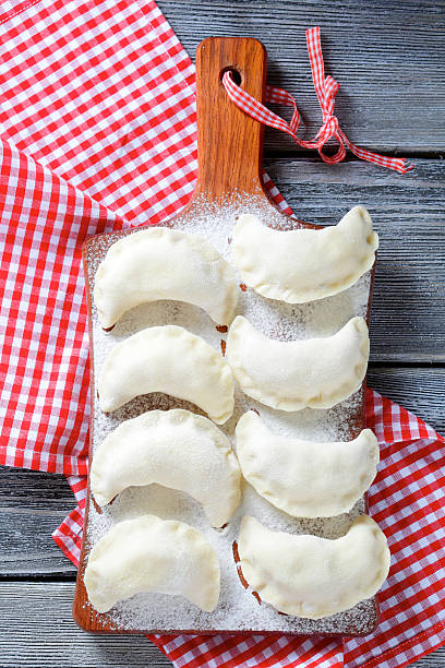 istock Traditional raw pierogi on the cutting board 466346246