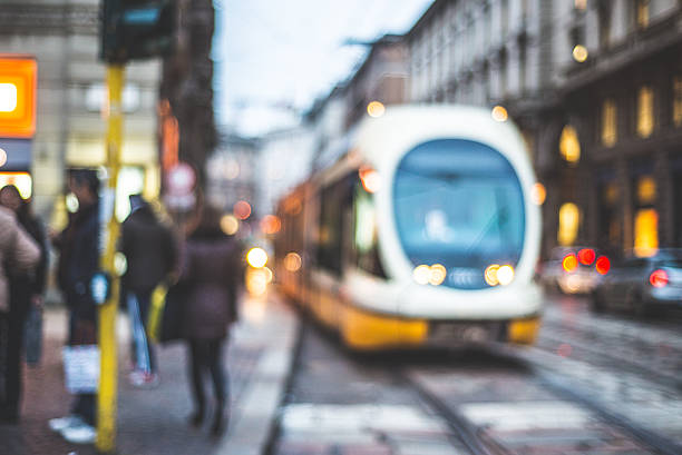 istock blurred city and people 466346731
