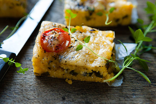 istock polenta with tomato and cheese 466346941