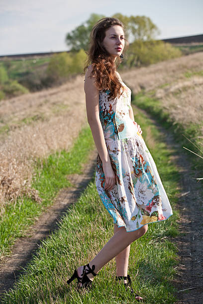 istock Beautiful girl in a field 466347231