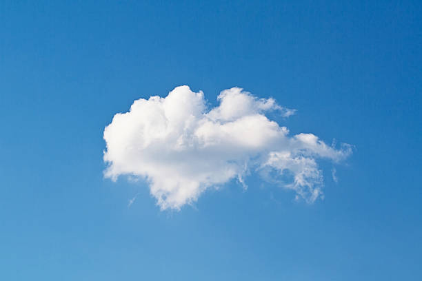 White cloud on blue sky One white cloud on blue sky single object stock pictures, royalty-free photos & images