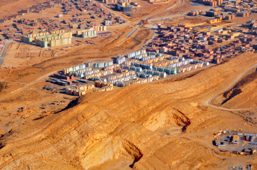 Biskra, Algeria: edge of the city, border with the desert seen from the air - photo by M.Torres