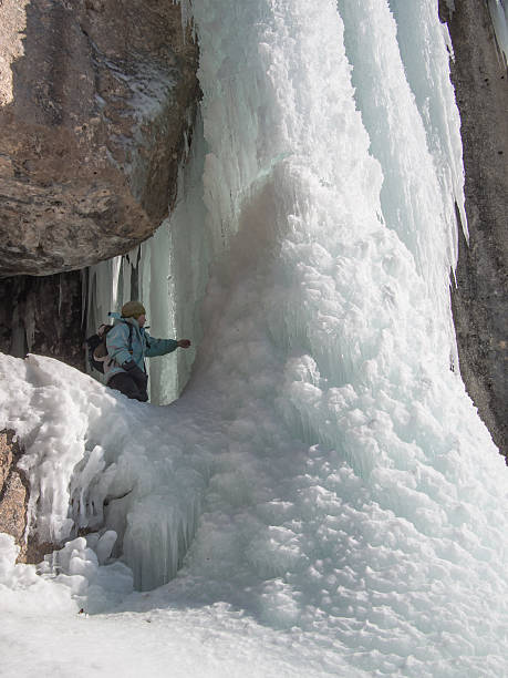 istock Boy examines a block of ice 466352027