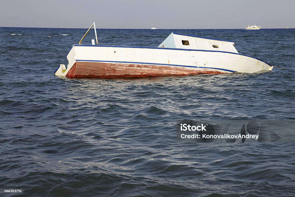 sunken boat sunken boat in the sea Crash Stock Photo