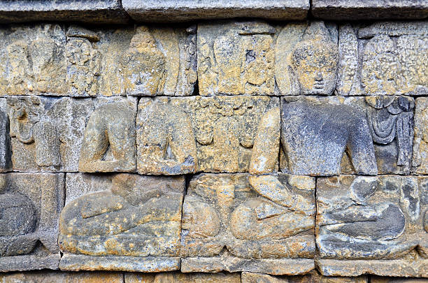 istock Buddhist bas-relief detail in borobudur temple sit 466354641