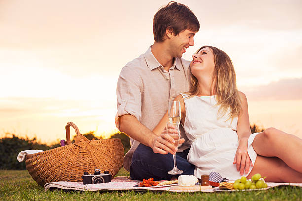 istock Couple Enjoying Romantic Sunset Picnic 466360693