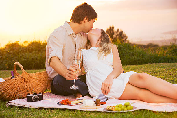 istock Couple Enjoying Romantic Sunset Picnic 466360701