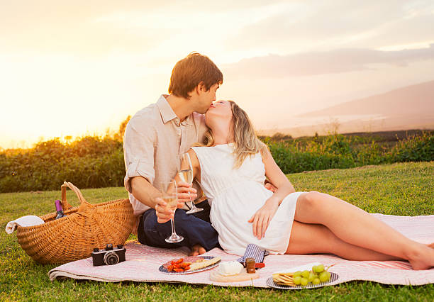 istock Couple Enjoying Romantic Sunset Picnic 466360711