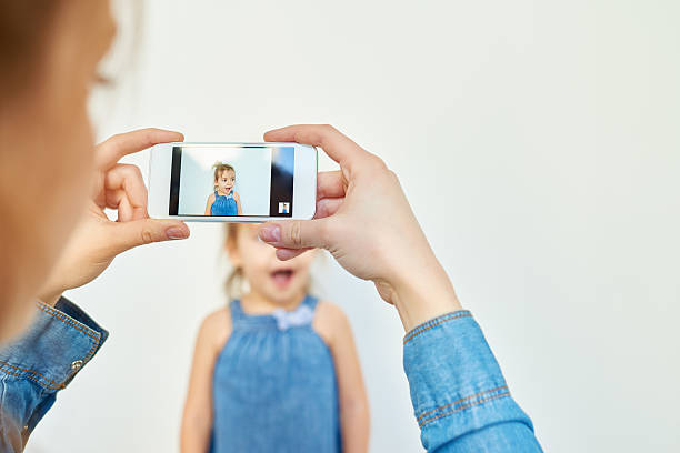 istock Photographing a daughter 466364916