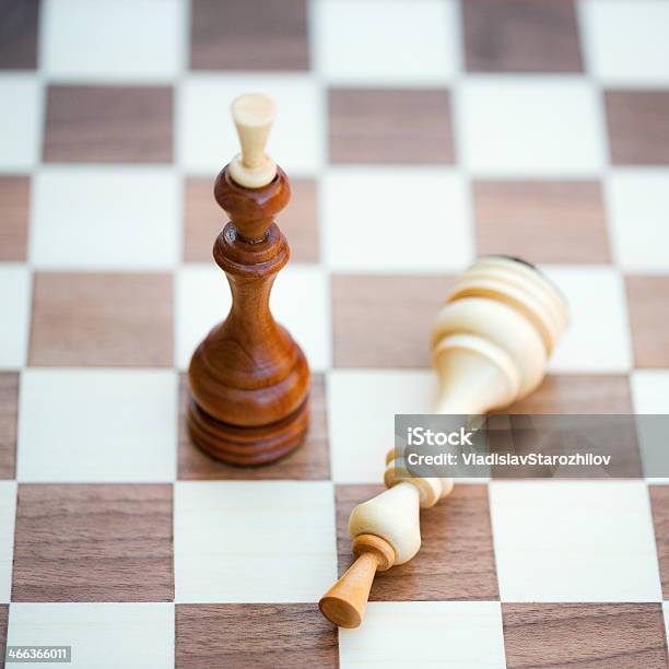 Two Chess Pieces Alone On A Chess Board Stock Photo - Download Image Now - Board Game, Chess, Chess Board