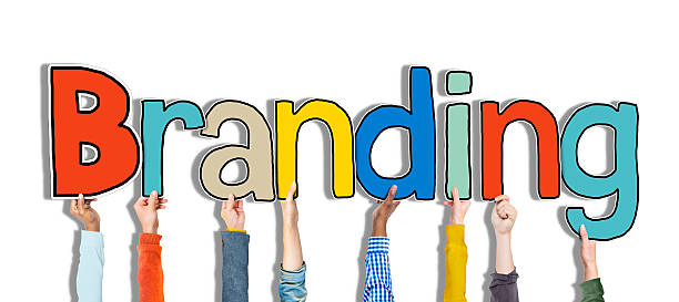 istock Diverse Hands Holding the Word Branding 466367608