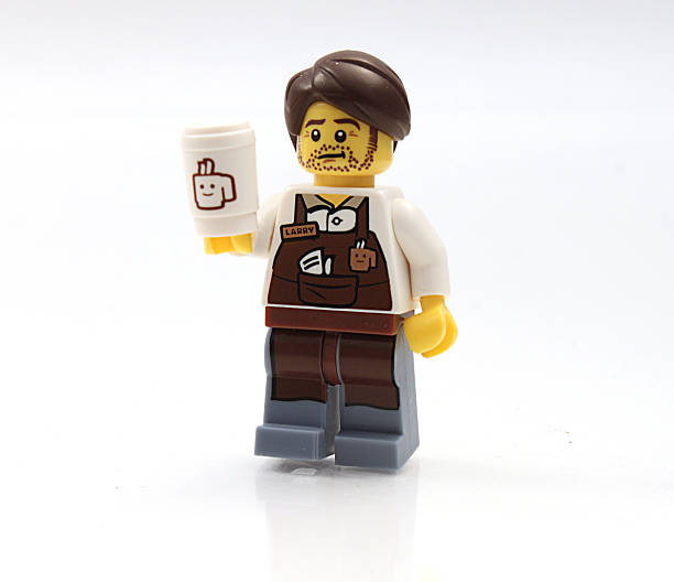 kaffeeverkauf - lego figurine men isolated stock-fotos und bilder