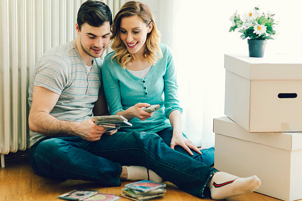 istock Couple Enjoy In Their New Home. 466374016