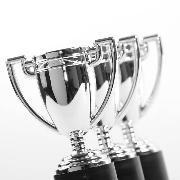 istock Toy Silver Trophy Cups in a Row 466379303