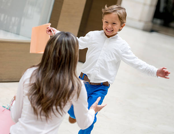 istock Excited boy giving a hug to his mother 466379906
