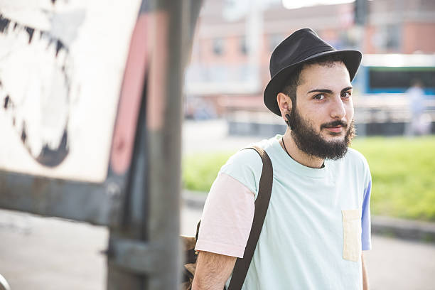 istock young handsome hipster gay modern man 466379926