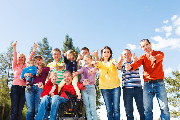 istock Disabled Man with family outside. 466380174