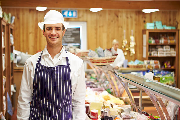 istock Male Sales Assistant In Delicatessen 466380211