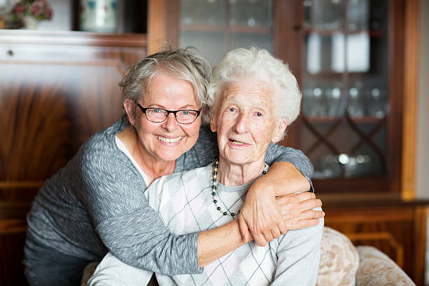 istock senior adult getting care and assistance 466386286