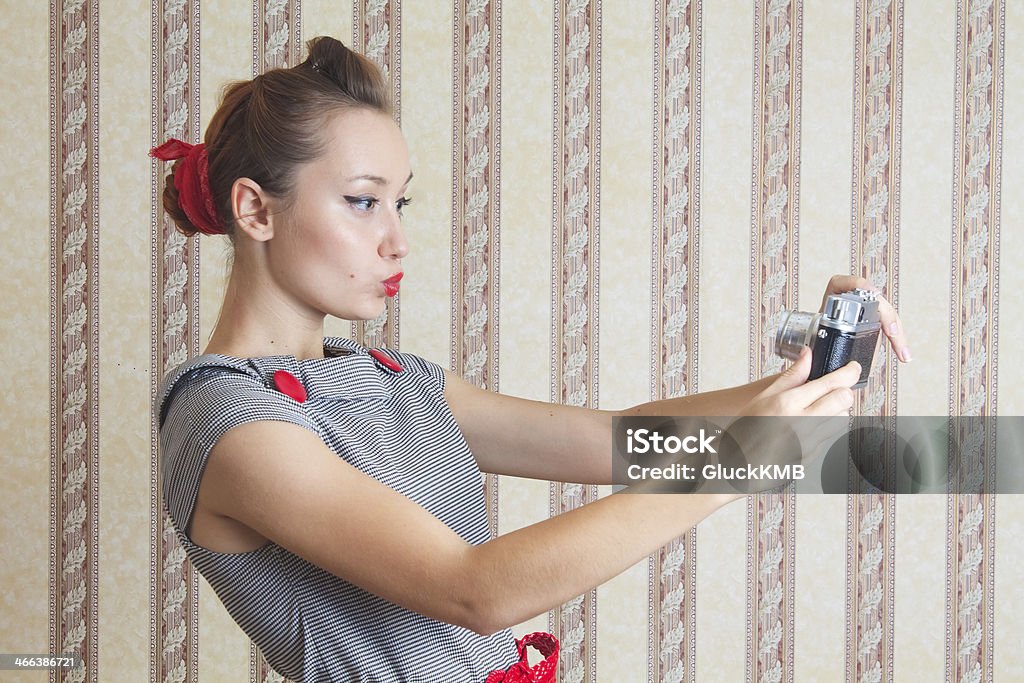 Young Woman Shoots Herself On An Old Camera Stock Photo - Download