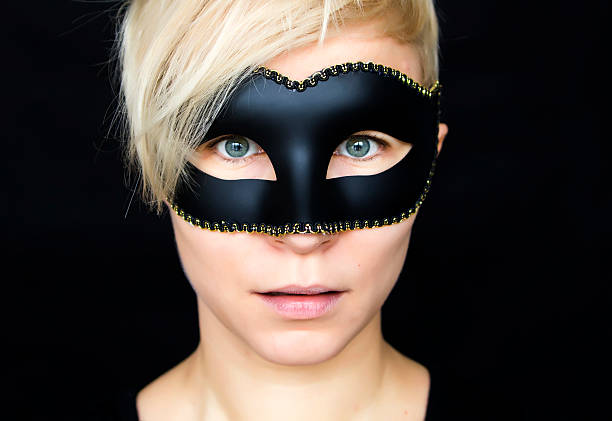 istock woman in mask 466386947