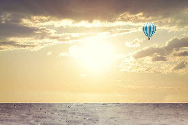 istock Evening sunset. Concrete floor on background of clouds, sun with 466390246