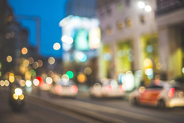 istock blurred city and people 466390473