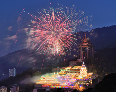 Kek Lok Si Temple with fireworks during Chinese new Year ceremony