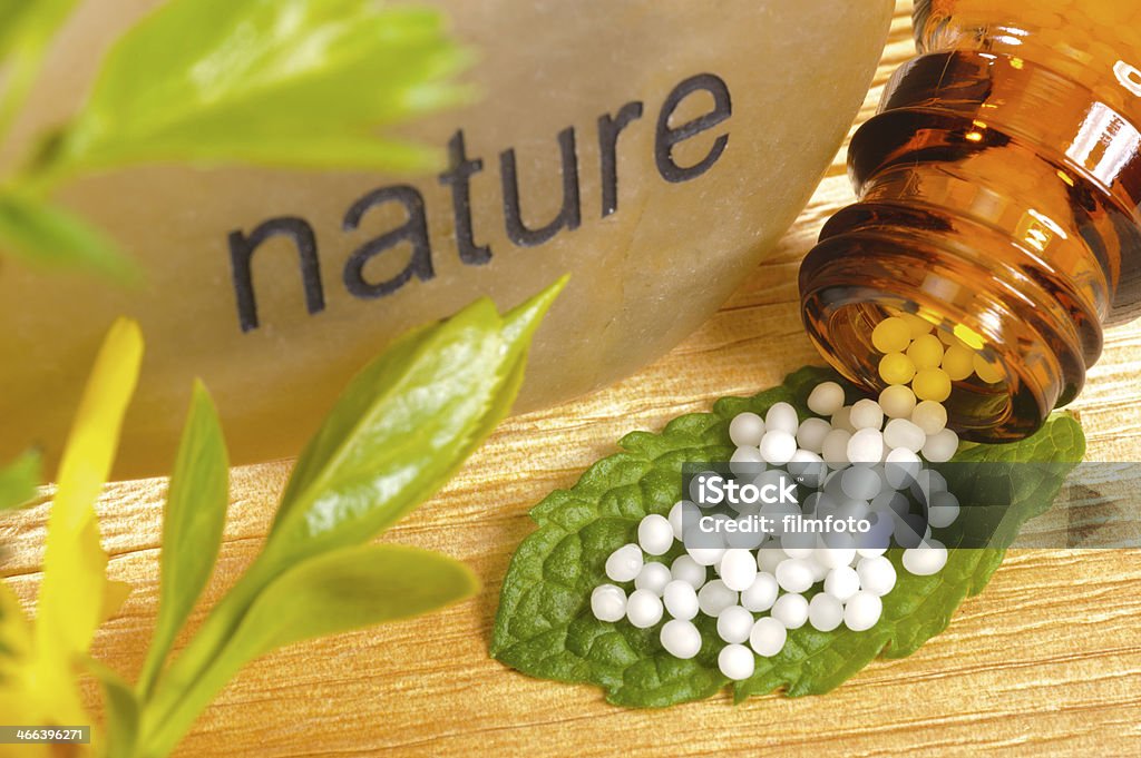 alternative medicine alternative medicine with homeopathy and herbal pills Alternative Medicine Stock Photo