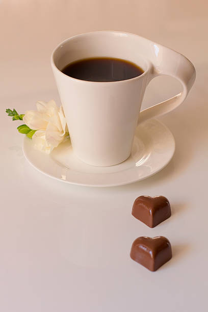 istock cup of black coffee on white saucer 466397585
