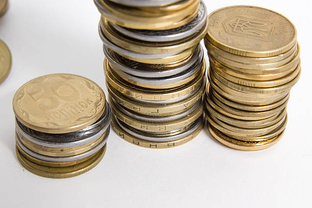 istock Columns of coins isolated on white background 466400242