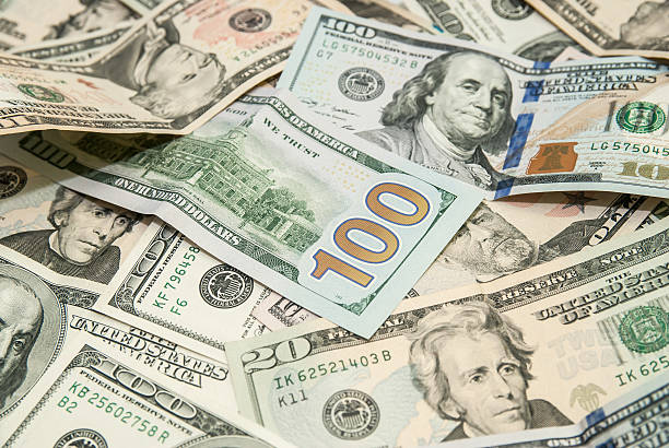 istock heap of dollars,  USD background texture 466400248