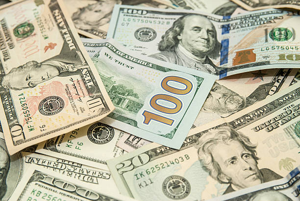 istock heap of dollars,  USD background texture 466400252