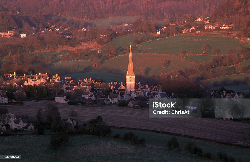 Scenic Cotswolds - Painswick England, Cotswolds, Gloucestershire, view of Painswick glowing in  evening sun Building Exterior Stock Photo