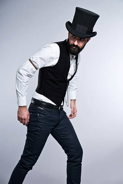 istock Retro hipster 1900 fashion man with black hat and beard. 466401475