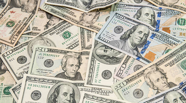 istock heap of dollars,  USD background texture 466404288