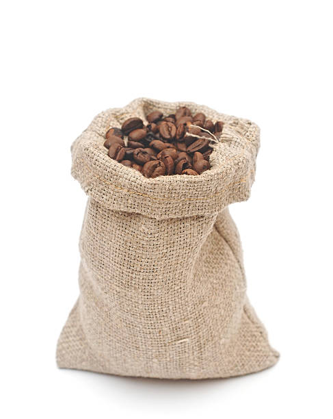 istock coffee beans and burlap sack isolated on white 466407477