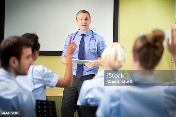 Doctor Briefing Nursing Students Stock Photo - Download Image Now - Leadership, Nurse, 20-29 Years