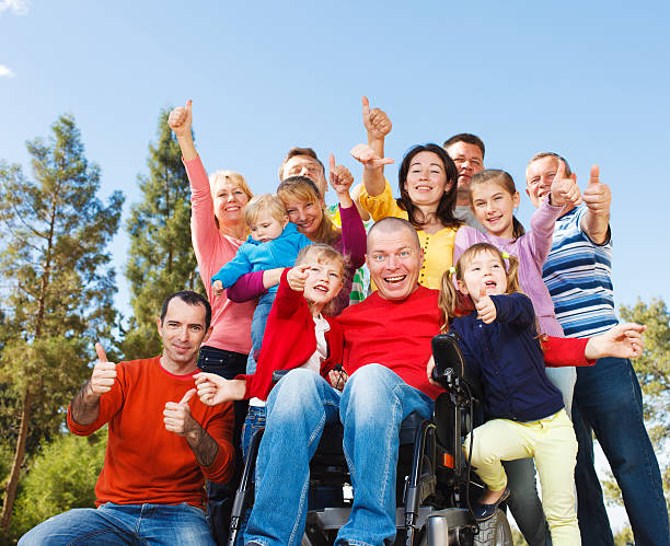 istock Disabled Man with family outside. 466409176