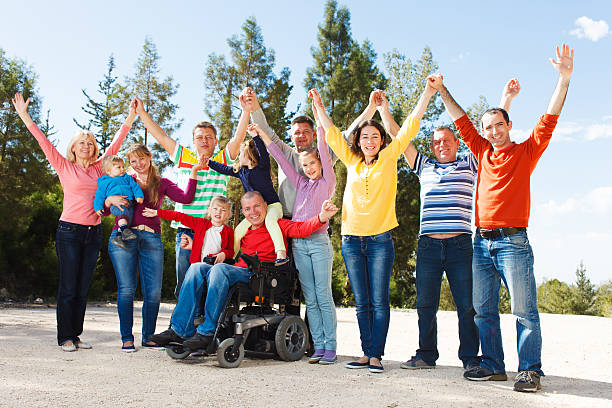 istock Disabled Man with family outside. 466409204