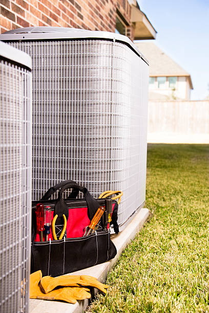 istock Service Industry:  Work tools, gloves beside air conditioners. Outside home. 466410091